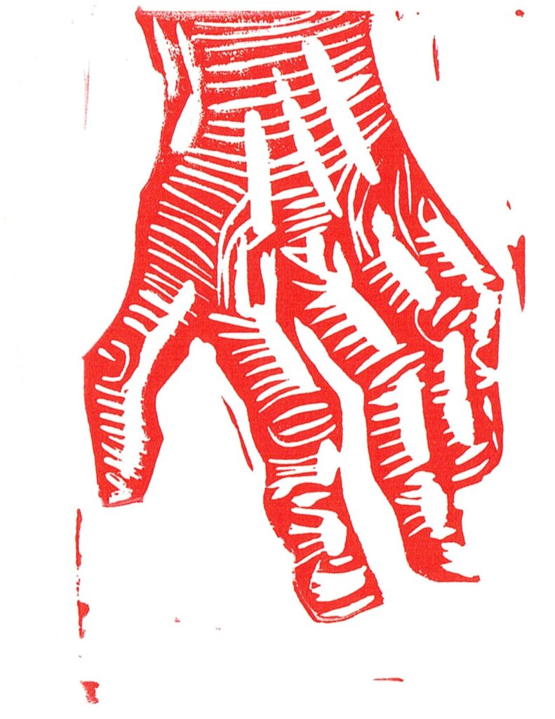 A linocut of a knobby left hand printed in red ink.